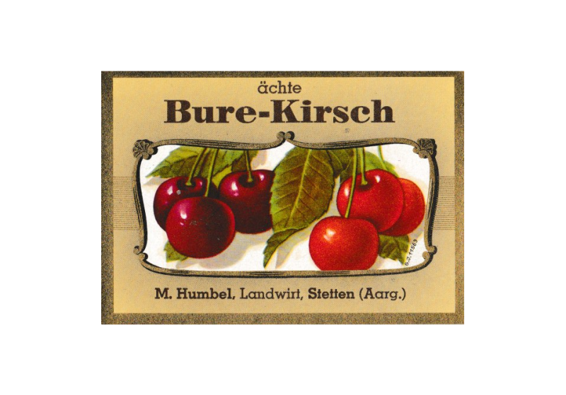 seit 1918 unver­än­dert Humbels Bure-Kirsch-Etikett